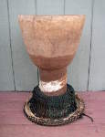 Djembe that needs new skin and rope and needs work on the shell and rings.