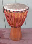 African djembe with a fresh drum head.