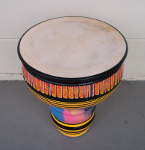 Brightly decorated clay doumbek with new drumhead.