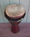 African Djembe that needs new rope and skin.