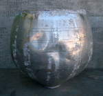 The dented shell of a tabla bayan.
