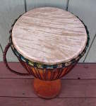 African djembe with a new goatskin drumhead.