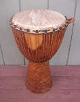 African djembe hand drum that needs to be reheaded.
