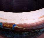 A crack on the shell of a ceramic doumbek.