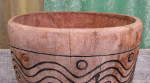 Old African djembe shell with cracks around the bearing edge.