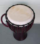 Djembe hand drum with new rings, rope and skin.