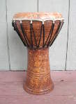 Clay Moroccan doumbek sporting a fresh fish skin drum head and restored shell.