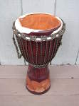 Djembe hand drum that needs a drum head and better rope.