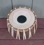 Tabla bayan with a fresh drum head.