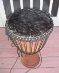 Djembe goat skin with excess skin removed.