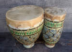 Clay Moroccan bongos that need repair.
