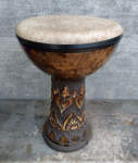 Ceramic darbuka hand drum with African drumskin.
