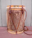 A fully repaired South American bombo drum.