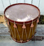 Pre civil war bass drum with new rope, pig ears and calfskin drumheads.