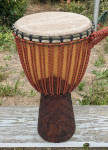 African djembe made of hardwood, African goat skin, custom rings and high grade rope.