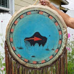 Double sided Native American frame drum with painted drum head.