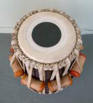 Tabla dayan with a kundal that has been replaced.