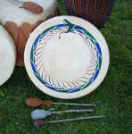 Hoop drum with an oroboros painted on the elk skin drumhead.