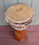 Djembe from Mali, Gambia with a torn drum head.