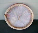 Rear view of a Native American medicine drum with a tear.