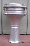 An aluminum darbuka without a drum head.