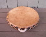 Medicine drum with new lacing and intact shell.