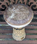 A Middle Eastern clay doumbek with a new fish skin drum head.
