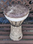 An Egyptian ceramic doumbek with a newly installed fish skin drumhead.