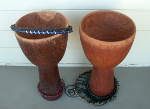 A pair of djembes shells and rings.