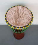 Djembe hand drum with new goat skin and rope.