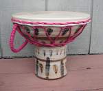 Ceramic doumbek with a fresh drum head.