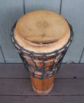 The torn drum head of an ashiko.