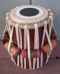 A tabla dayan with a new pudi and tasma.