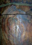 Another crack on the outside of a djembe drum shell.