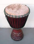 Djembe hand drum with a fresh goat skin drumhead.