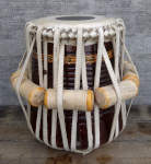 A tabla dayan with repaired shell fully reassembled.