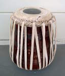 Tabla dayan with damaged drum head.