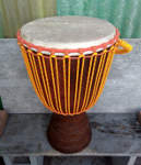 Iroko wood djembe hand drum.